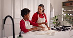 Baking, teaching and mom with child in kitchen for bonding with preparing pastry for cookies. Happy, learning and mother with boy kid for cooking food together with development in family home.