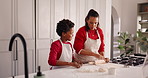 Baking, teaching and mother with kid in kitchen for bonding with preparing pastry for cookies. Happy, learning and mom with boy child for cooking food together with development in family home.