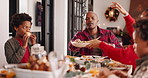 Christmas dinner, family and pass plate in home with children, talk and parents bonding. Xmas, mother and father with kids for food, holiday celebration and African siblings eating healthy meal