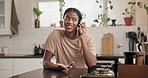 Gossip, laughing and phone call with black woman in kitchen of home for chatting or conversation. Communication, funny and mobile with African person in apartment for contact, speaking or update