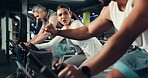 Spin class, fitness and fist bump with woman in gym for cycling machine, wellness and cardio workout. Stationary bike, exercise and motivation with people in sports club for training, health and team
