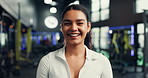 Gym, personal trainer and face of woman with smile for exercise, training routine and workout. Fitness center, health club and portrait of person with confidence, pride and happy for wellness coach