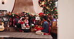 Happy, African family and children for Christmas celebration, gift giving and festive season. Smile, parents and kids relax for presents, xmas tradition and Santa surprise of bonding together in home