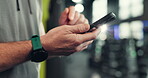 Phone, search and hands of man at gym for fitness app, workout schedule and communication. Networking, training guide and online exercise with person in sports club for connection, chat and web