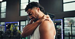 Hand, man and shoulder pain in gym, fitness injury or muscle tension with pressure. Joint ache, nerve damage or male athlete with massage for fracture or sprain with intense exercise at center