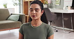 Calm, breathing and woman in home with meditation, zen or mindfulness in living room in morning. Relax, wellness and female person with health, spiritual or yoga exercise for balance in apartment.