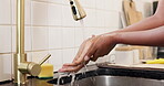 Woman, water and washing hands at tap in kitchen for dirt removal, germ prevention and wellness. Hygiene, person and cleaning bacteria at faucet in home for skincare, healthy habit and cleanliness