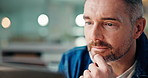 Business, man and thinking with laptop in office for app development, coding and system design. Software developer, bokeh and mature person at night for program testing, solution and UI maintenance