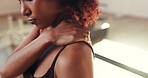 Woman, fitness and neck pain with injury for stress, discomfort or muscle tension in gym. Shoulder, female person or strain with sore joint, ache or inflammation for fibromyalgia or pressure in club