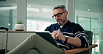 Airport lounge, stylus and man with luggage, tablet and travel with journey, online reading and relax. Mature person, employee or worker with tech, communication and waiting with email or digital app