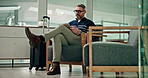 Airport lounge, delay and man with luggage, tablet and travel with journey, notification and email. Mature person, employee and worker with tech, online reading and waiting with website info or relax