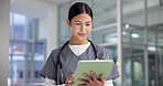 Woman, doctor and reading on tablet at hospital for research, medical report and schedule surgery. Female person, digital and review for patient feedback, healthcare results and treatment information