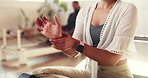Woman, hands and gym with wrist pain for carpal tunnel syndrome or joint inflammation. Female person, arm exercise and movement with sore injury or discomfort for physical strain or pressure in club