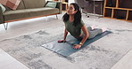 Woman, stretching and yoga for fitness at house with breathing exercise, body balance and wellness. Female person, cobra pose and awareness for pilates zen, holistic healing and flexibility routine