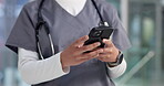 Doctor, person or typing with phone in hospital for telehealth feedback, medical results or email. Medicine, professional and smartphone in clinic for surgery schedule update, health research or news