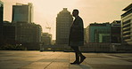 Morning, thinking and businessman in city walking on commute, travel and journey to work in urban town. Professional, corporate and mature person with sunrise for career, finance job and ambition