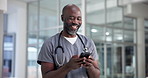 Doctor, man or laughing with phone in clinic for healthcare meme, medical update and telehealth. Medicine, mature black person or happy with smartphone in hospital for schedule planning or funny chat