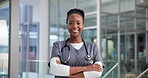 Doctor, face and black woman with arms crossed in hospital for medical service, health or pride. Medicine, employee or happy in clinic for healthcare support, about us confidence or cardiology expert