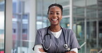 Woman, face and doctor laughing with arms crossed in clinic for help, health support and confidence. Medicine, black person and happy in lobby for healthcare work, about us pride and hospital service
