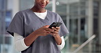 Hands, doctor and woman in hallway, smartphone and typing with connection, smile and email. Cellphone, healthcare or professional in hospital, wellness or digital app for online chatting and message