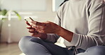 Woman, hands and phone in pilates class for communication, social media or typing on fitness app. Closeup, female person or yogi on smartphone for online chatting, texting and break for yoga blog