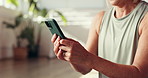 Woman, hands and phone in fitness for communication, social media or typing on yoga app at class. Mature, female person or yogi on smartphone for online chatting, texting and break for pilates