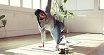 Fitness, stretching and yoga with woman in studio for health, holistic routine or wellness. Exercise, flexibility and hand raised with yogi person on wooden floor for balance, development or practice