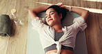 Above, woman and rest on mat in yoga class for fitness break, holistic exercise and inner peace. Female person, relaxing and thinking with zen, stress relief and muscle recovery from pilates routine