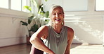 Mature, happy woman or face in health club for yoga, pilates or spiritual wellness in fitness. Portrait, female person or yogi instructor with smile in joy for zen, mindfulness or physical wellbeing