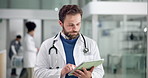 Man, doctor and walking with tablet for medical research, patient history or online diagnoisis. Male person, healthcare worker or employee with technology for telehealth or planning clinic procedure