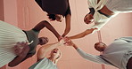 Applause, huddle and palm with women in studio together for health, wellness or yoga from below. Fitness, stack of hands and success with group of friends in circle for energy, excitement or pilates