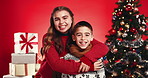 Christmas, face and happy kids hug with siblings for love and holiday celebration. Girl, children and embrace boy on xmas with brother, sister and family portrait with laugh on red studio background