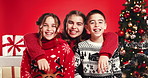 Christmas, face and mother hug kids for love, care or support on red studio background. Xmas, mom and embrace happy children, siblings and parent laugh for holiday celebration with family portrait