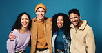 Face, laugh or group with fashion in studio for upcycling campaign, about us or sustainable clothing. Happy, people and hug on blue background for eco friendly brand promo, cozy community and pride