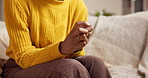 Hands, stress and fidget on couch in home with anxiety, worry and insight for decision in living room. Person, fingers and mental health on sofa, adhd or frustrated for choice in lounge at apartment