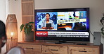 Screen, person and watching tv with breaking news, broadcast and increase in gender based violence. Television display, home and woman listen to info for crime rate, headline and report in lounge