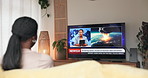 Woman, watching tv and screen for news report with back for nuclear threat, war or global conflict at home. Person, television and fear with broadcast, military attack or hydrogen bomb at apartment