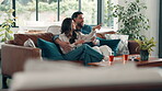 Happy, couple and drinks in living room, movies or bonding on break in home, entertainment or relax. Watching tv, love and people on date in lounge, beverage and subscription for film, hug and house