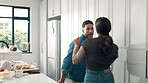Fun, couple and dancing in kitchen, romance or bonding on weekend, relationship or together in home. Love, woman and man with rhythm in house,  playful and happy people with celebration on break