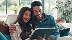 Home, tablet and couple with smile, embrace and bonding together with social media, love and meme. Relationship, man and woman on sofa, tech or search for funny videos, email and online entertainment