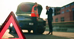 Conversation, roadside assistance and warning triangle with people outdoor for fail or mistake. Breakdown, emergency service and mechanic speaking to driver in city for caution, help or insurance