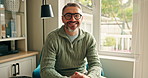 Face, happy and mature man in home for relax, peace and calm in morning on weekend break. Glasses, portrait and smile with person in lounge for laugh, thinking and good mood in house in Switzerland