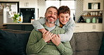 Face, dad and hug with child, home or bonding in living room with smile, laughing or relax on break. Parent, man and embrace with boy, family and happy together on weekend, love or chilling in house