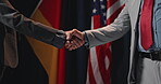 People, handshake and politician at election event for respect, political agreement and alliance. Candidates, shaking hands and diplomacy deal, international negotiation and government of partnership