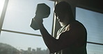 Exercise, man and dumbbells with weightlifting at gym for strength training, biceps growth or power. Low angle, mature person or resistance workout at sports club for competition fitness or endurance