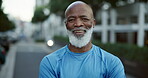 Smile, runner and face of black man in city for cardio, workout and fitness challenge. Exercise, marathon training and sports performance with mature person outdoor for health, happy and athlete