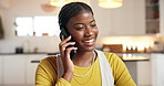 Happy black woman, phone call and talking in home with communication, discussion or update. Mobile, smile or conversation with contact in kitchen for instruction, explain or feedback with information