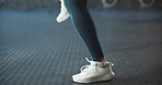 Running, warm up and shoes of woman in gym for workout, training and fitness for marathon. Sports, runner and feet of person for exercise, strength and leg muscles for wellness, health and endurance