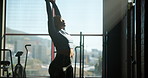 Stretching, morning and black woman in gym for exercise, workout and training for wellness. Sports center, health club and person with warm up for fitness, muscle strength or mobility for performance