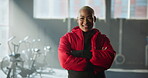 Androgynous. arms crossed and face of black person in gym for development, training or workout. Exercise, fitness and smile of non binary athlete in health club for challenge, sports or wellness